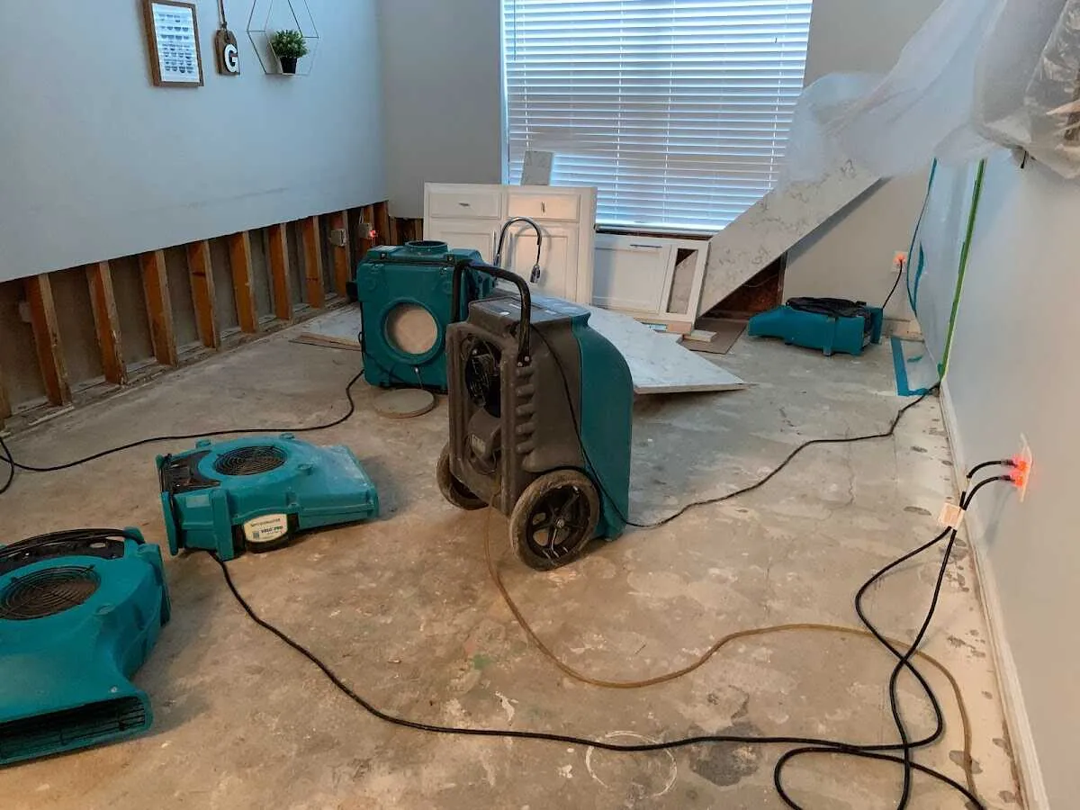 Dehumidifier in flood-cut room for Water Damage Restoration in McComb